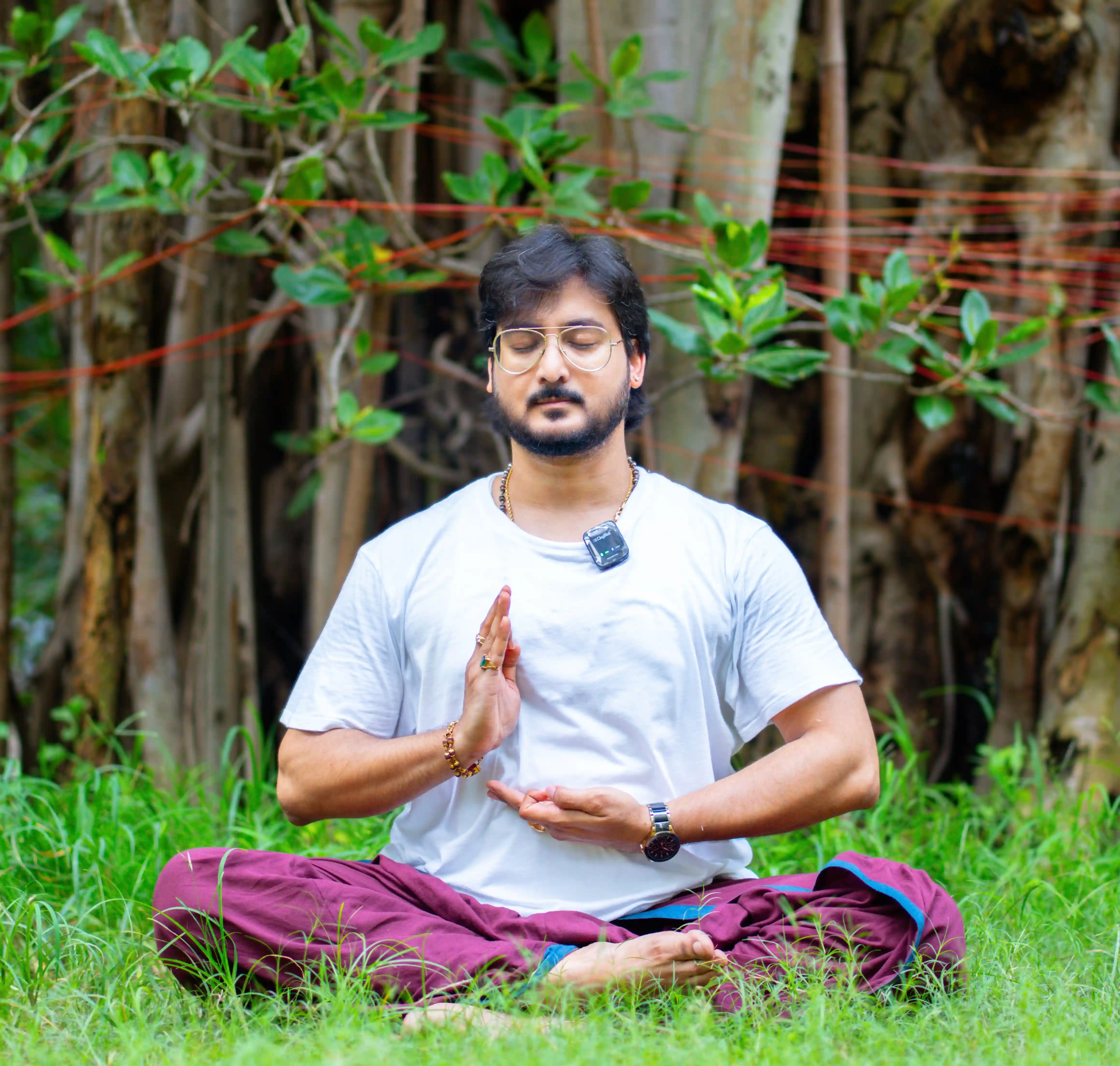 An advanced student at Nabatara practicing rigorous postures guided by Gaurav Tribedi to strengthen the nervous system and align the kundalini chakras in human body for physical peak performance.